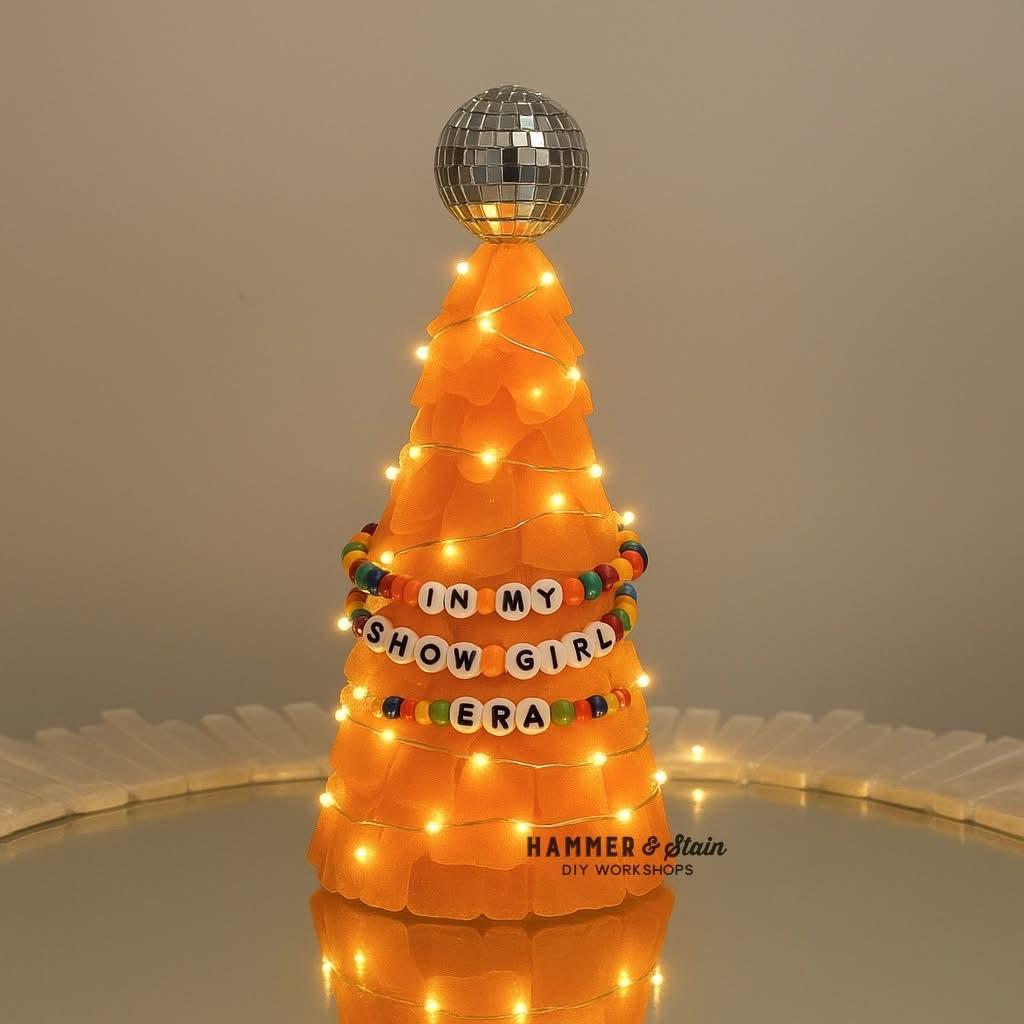 Orange Taylor Swift sea glass tree with lights: In my show girl era.