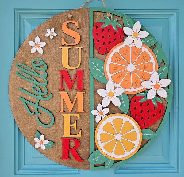 Decorative wall art with 'Summer' text and fruits on a blue background