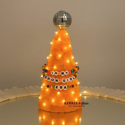 Orange Taylor Swift sea glass  tree with lights: In my show girl era.