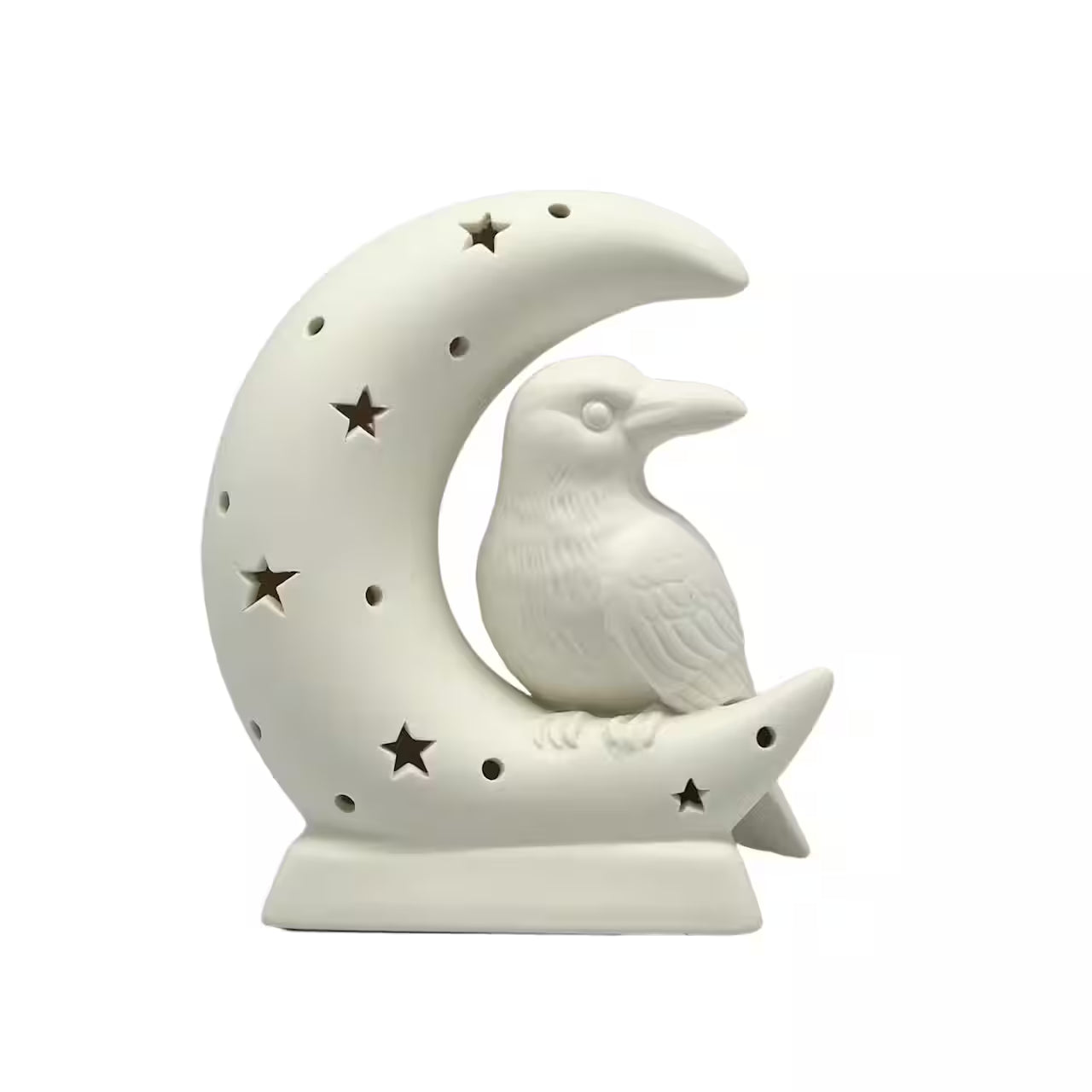 A white ceramic raven figurine perched on a crescent moon with star cutouts, set against a plain white background.