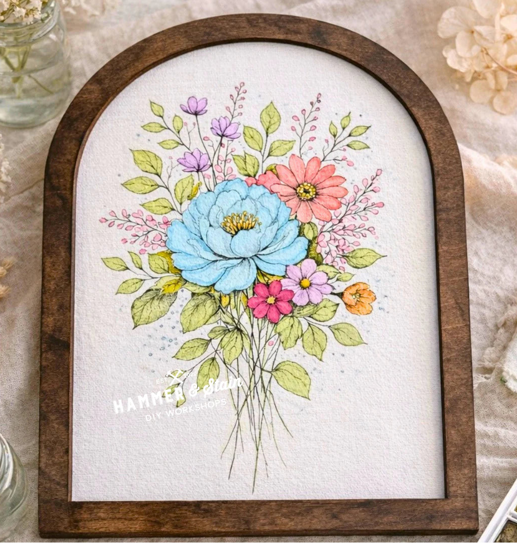 Floral illustration in a wooden frame on a textured surface
