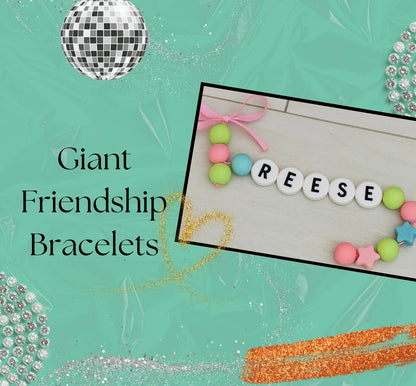Giant friendship bracelets with colorful beads and letter tiles on a turquoise background with disco ball and rhinestones.