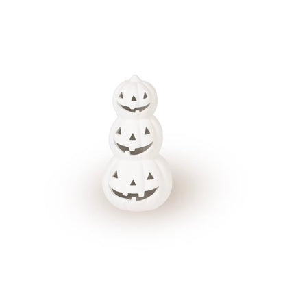 A small white decorative figurine shaped like a stack of three jack-o'-lantern pumpkins with carved facial cutouts, centered on a plain white background.